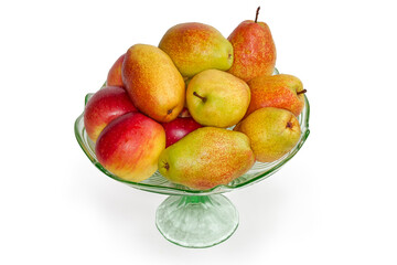 Pears and red apples in vintage glass vase for fruits