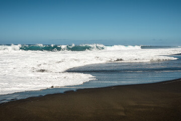 wave breaking on the beach