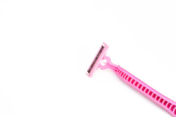Pink shaving razor isolated on white