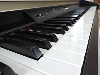 Close-up black and white keys of a digital piano
