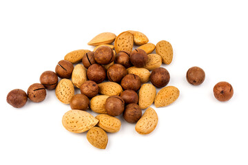 Assorted Nuts. Background of nuts - macadamia, almonds, isolated on white background