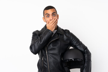 Young handsome man with a motorcycle helmet over isolated white background with surprise facial expression