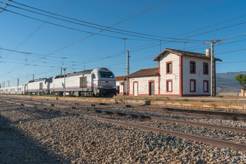 Train circulating on a track in southern Spain