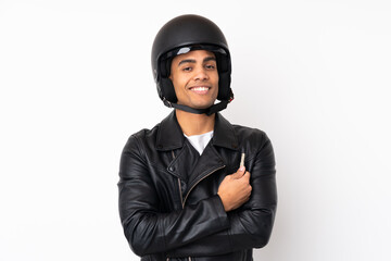 Young handsome man with a motorcycle helmet over isolated white background