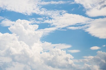 White fluffy clouds in blue sky, beautiful sky background