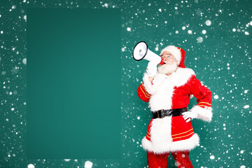 Real Santa Claus screaming through megaphone on a green background.