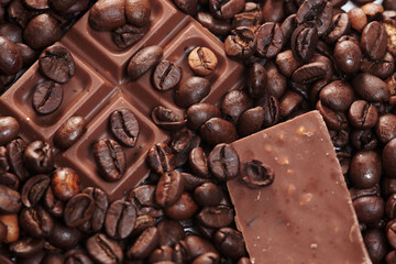 Pieces of dark chokolate and coffee beans