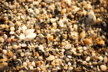 pebbles on the beach colorful background

