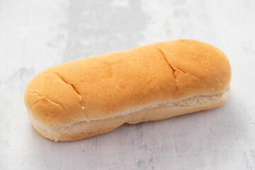 bread for hot-dog on ceramic background