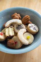 Group of delicious sweet Christmas cookies, white vanilla rolls, gingerbread, linzer and chocolate sweets wiht jam filling