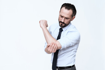 A man stands on a white background. 