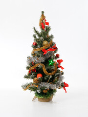 artificial christmas tree on a white background