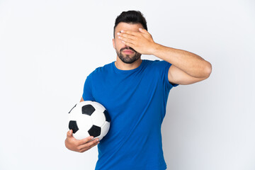 Handsome young football player man over isolated wall covering eyes by hands. Do not want to see something