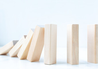 Business risk control imbalance concept on wooden blocks with copy space