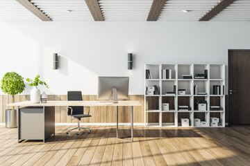 Modern CEO office with computer and shelves with documents.