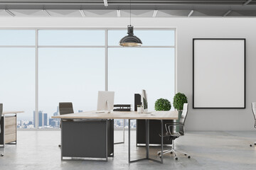 Modern office in loft style with large windows