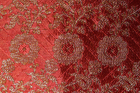 Indian Red Wedding Sari Close Up. Red And Gold Brocade Fabric