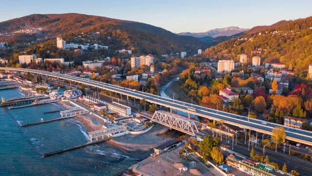 Khosta town timelapse. Aerial hyperlapse of the town of Khosta located in Caucasus Mountains in Russia at sunset