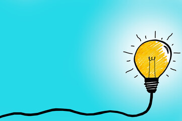 Glowing light bulb symbol on a light blue background. Concept for creative ideas and innovations.