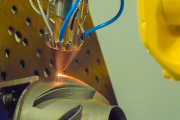 Metalworking, robotic, industrial concept. Direct metal deposition - advanced additive laser...
