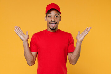 Delivery employee african man in red cap blank print t-shirt uniform workwear work courier service...