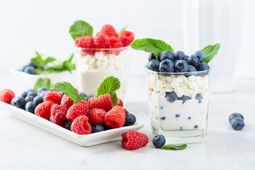 Curd dessert with berries and mint.