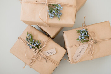 Close up of gift boxes with zero waste. minimalist style of gift wrapping. top view