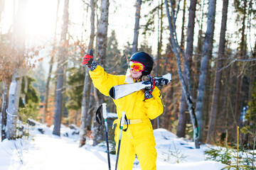 Fototapeta na wymiar Woman skier enjoy in winter sunny day, holiday