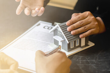 Real Estate concept. Lessors and landlords are discussing real estate leasing details.