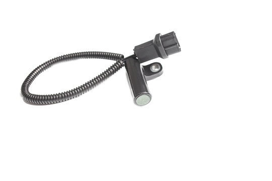 Car Engine Crankshaft Position Sensor On Isolated White Background.