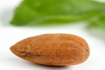 A pile of Almonds, isolated on a white background.