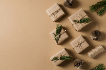 Kraft paper gift box on brown background, christmas, holidays and eco theme