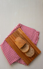 Fototapeta na wymiar Sliced bread isolated on textured light grey background. Healthy bread. Ketogenic diet.