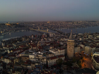 Obraz premium Aerial Galata Tower at Sunset. Galata Bridge and Golden Horn of Istanbul with beautiful colors at Sunset. 