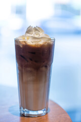 Iced coffee with whipped cream and sprinkle with almonds