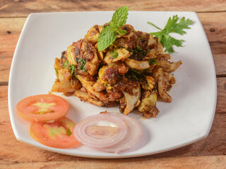 Masala egg fry, special street food made of boiled egg fried with onion, pepper and tomato, selective focus