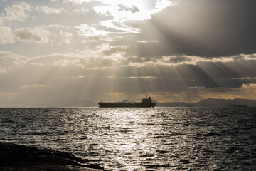 Ships under dramatic sky, Pireaus, Greece