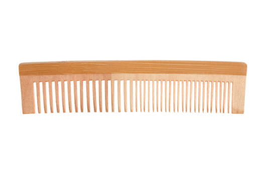 wooden comb isolated on white background with clipping path and copy space for your text