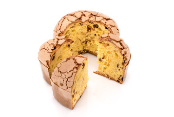 Panettone, classic Christmas Milan dessert with raisins and candied orange, sliced cake with three slices isolated on white