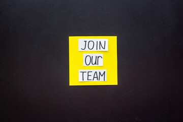 Join our team - recruting concept. Words Join our team on paper banner, top view