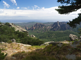Fototapeta na wymiar Wonderful view of rocky cliffs and trees under the sky