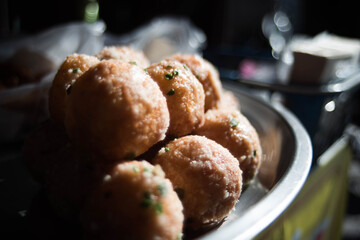 Sweets made from flour filled with sugar coated filling and fried to Thai people called Khai Hong dessert.