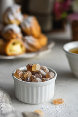A little bowl with lollipops, lumps of sugar