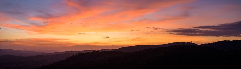 Fototapeta na wymiar Panoramic beautiful landscape mountains with sky sunset background