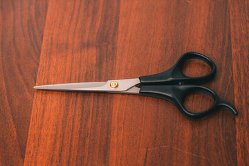 Scissors for cutting hair. Hairdressing tools. Hair care