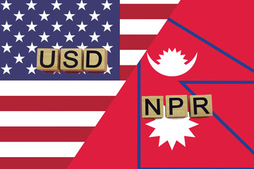 USA and Nepal currencies codes on national flags background