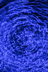 Blue abstract light traces shot on slow shutter speed