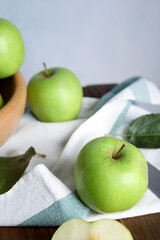 Fresh ripe green apples on wooden table