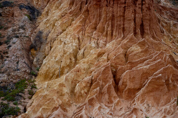 Red rock surface with cracks texture