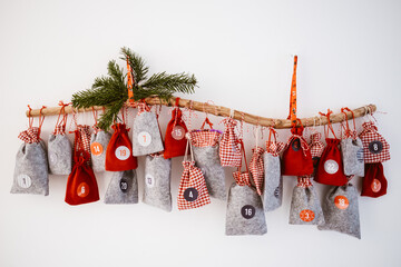 Homemade Advent Calendar with little, festive bags setting a Christmas mood.